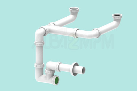 Space-saving inspectionable trap for twin basin sinks or one and a half basin sinks